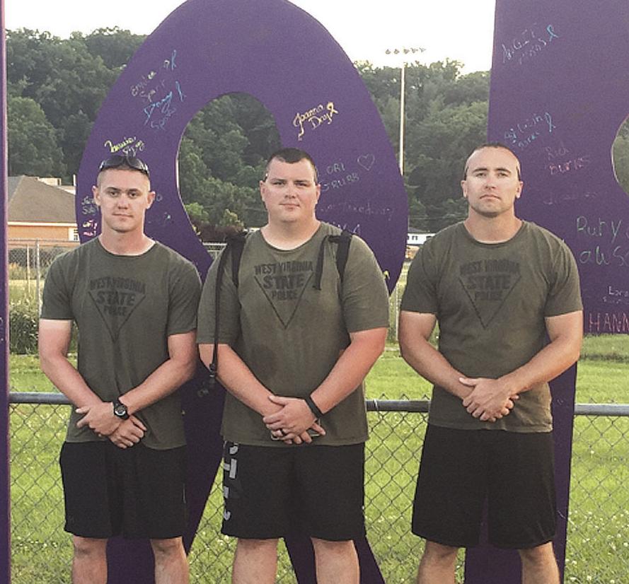 Three state troopers walk 12 hours nonstop to raise cancer awareness