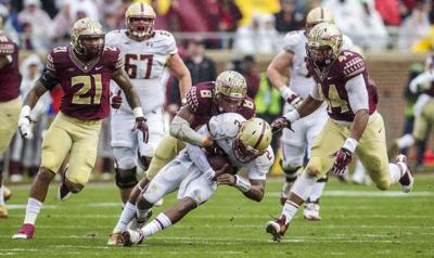 Top Four Teams Stay Put In New Ap Football Poll College Sports