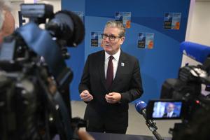 The Latest: NATO leaders agree on spending hike, vow to defend each other