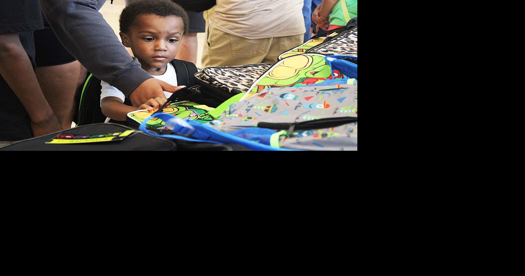 New backpacks and new haircuts get kids ready for school