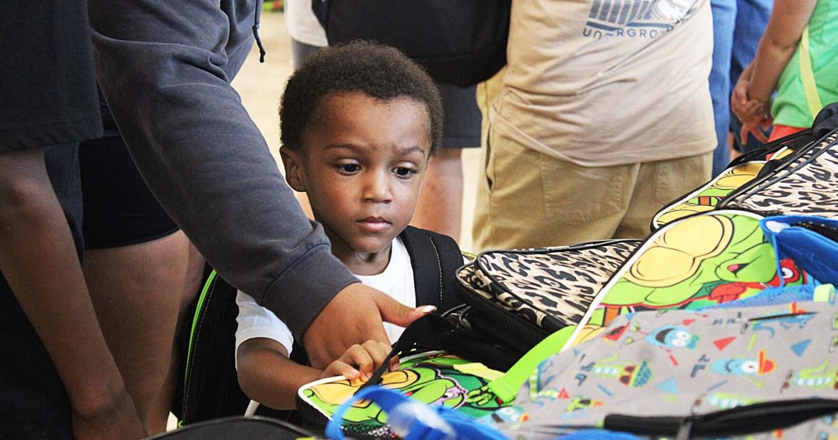 New backpacks and new haircuts get kids ready for school