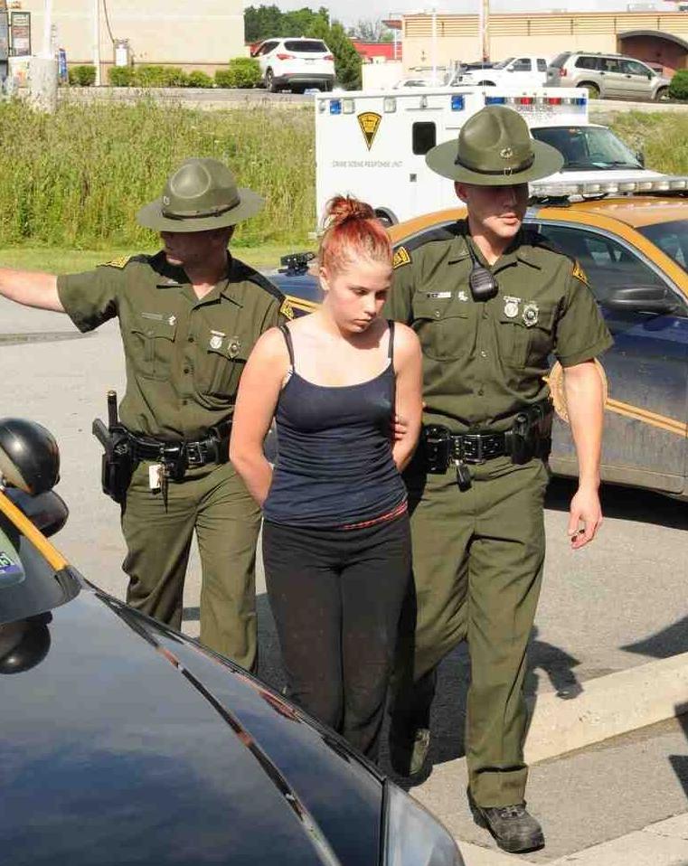 State police arrest suspects in throatslashing News