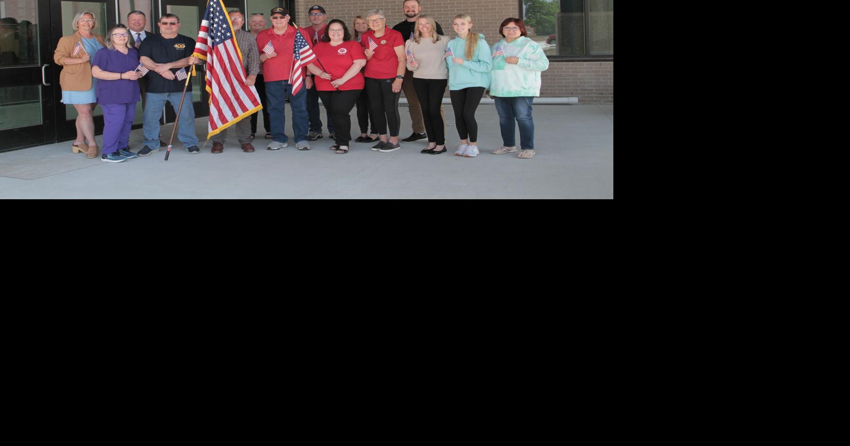 Auxiliary donates flags for the new Beatrice elementary school