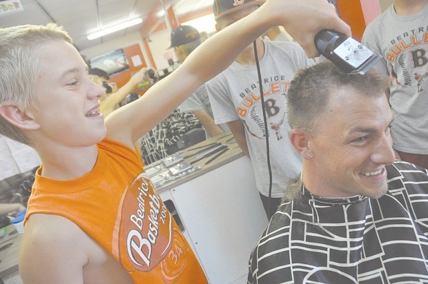 Maxson s barbers shave heads for fundraiser