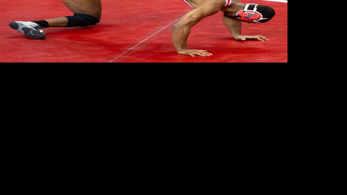 Photos: NU wrestlers take down Northwestern at the Devaney Center