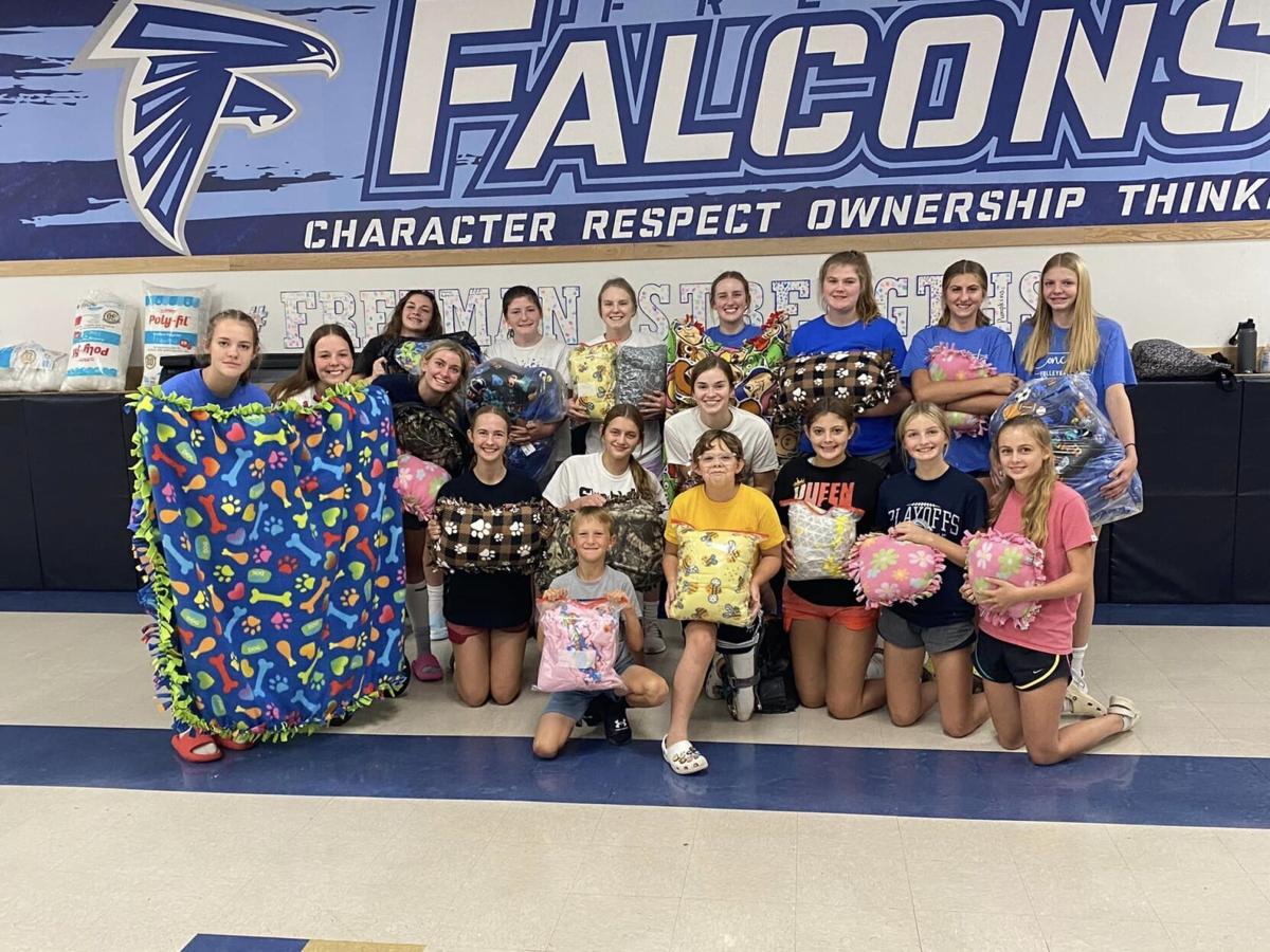 Freeman volleyball team donates blankets to cancer patients