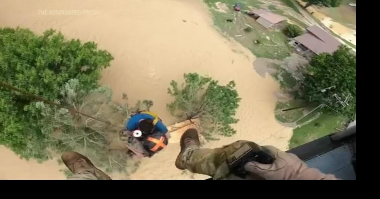 Kentucky flood victims lifted out by helicopter