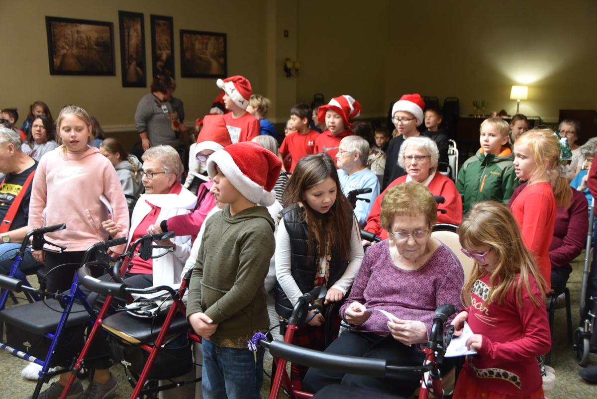 Paddock Lane students go caroling around Beatrice Education