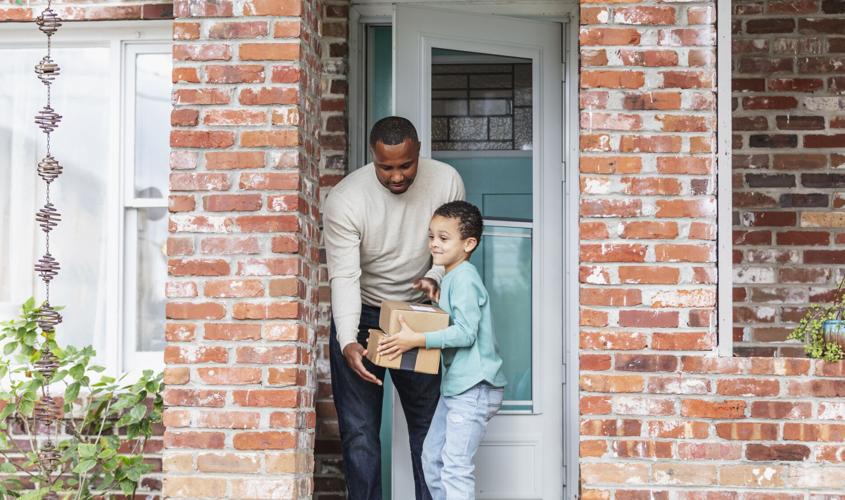 Boy helps father get boxes delivered, left on doorstep