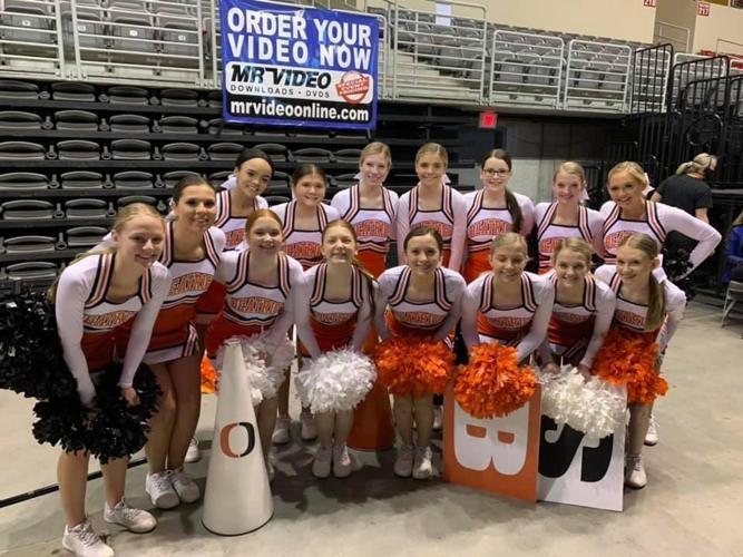 Spirited NCAA football cheerleaders around the country