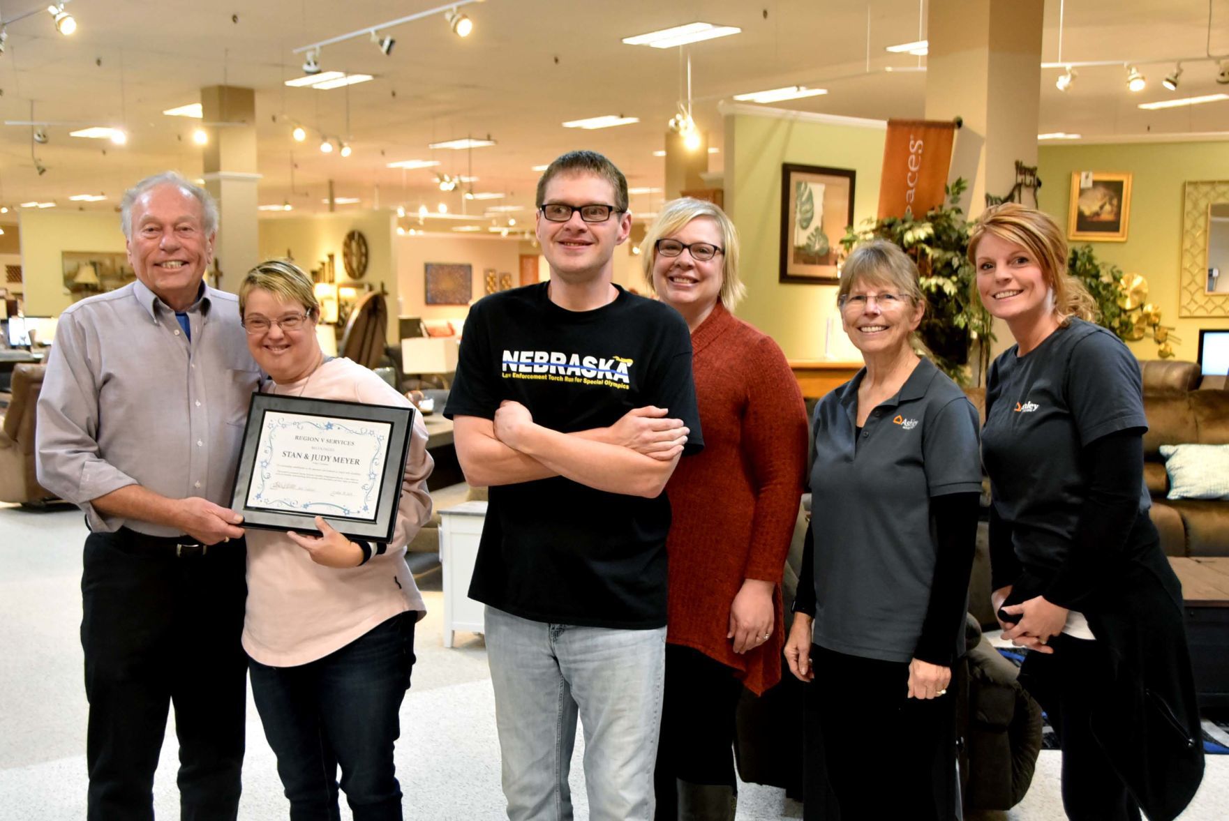 Ashley Furniture owners recognized for employing Region V Service