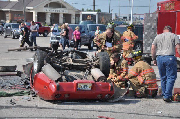 Driver dies in parking lot crash