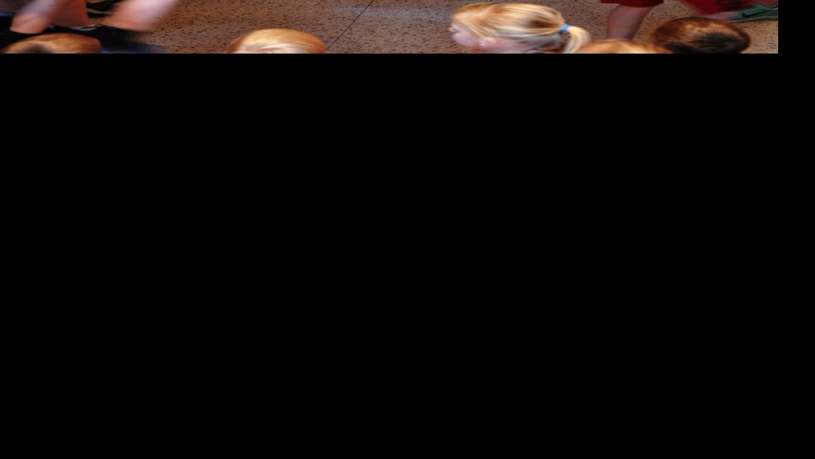 A sticky situation: Principal duct taped to wall