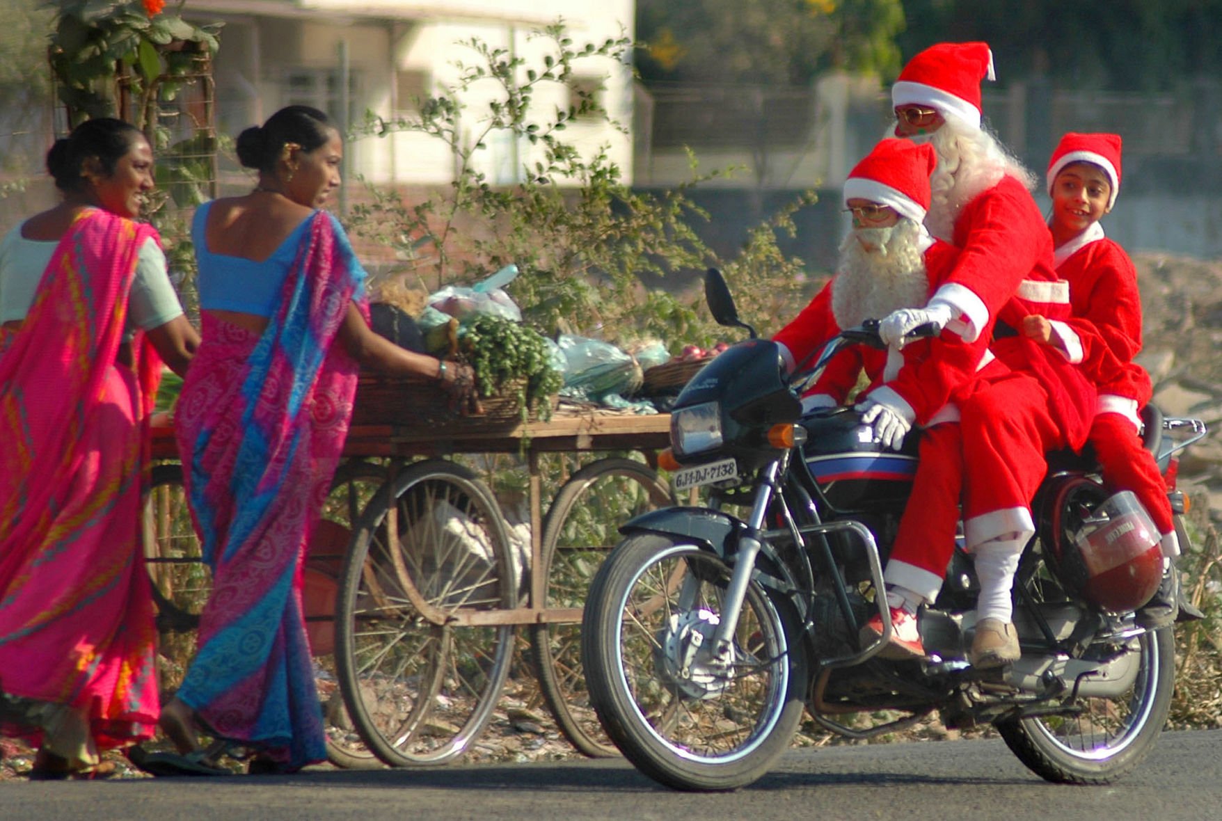 Photos Santa swaps sleigh for motorcycle