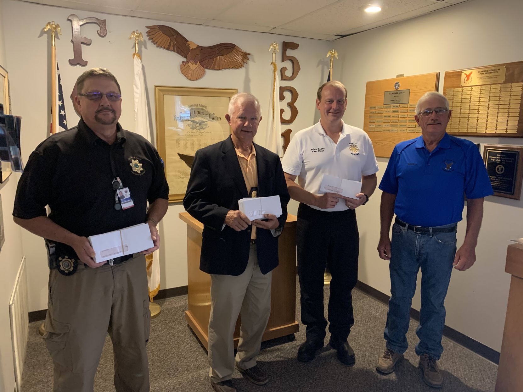 Eagles Club Aerie 531 donates checks to first responders