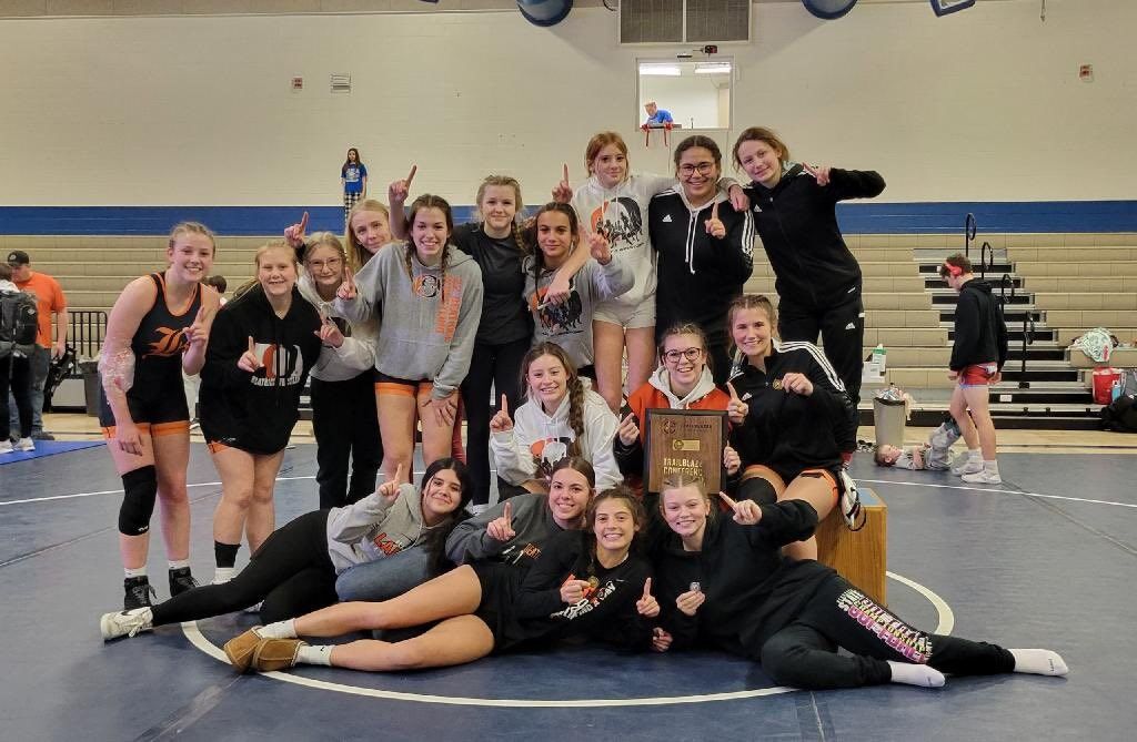 BHS wrestling teams win conference titles