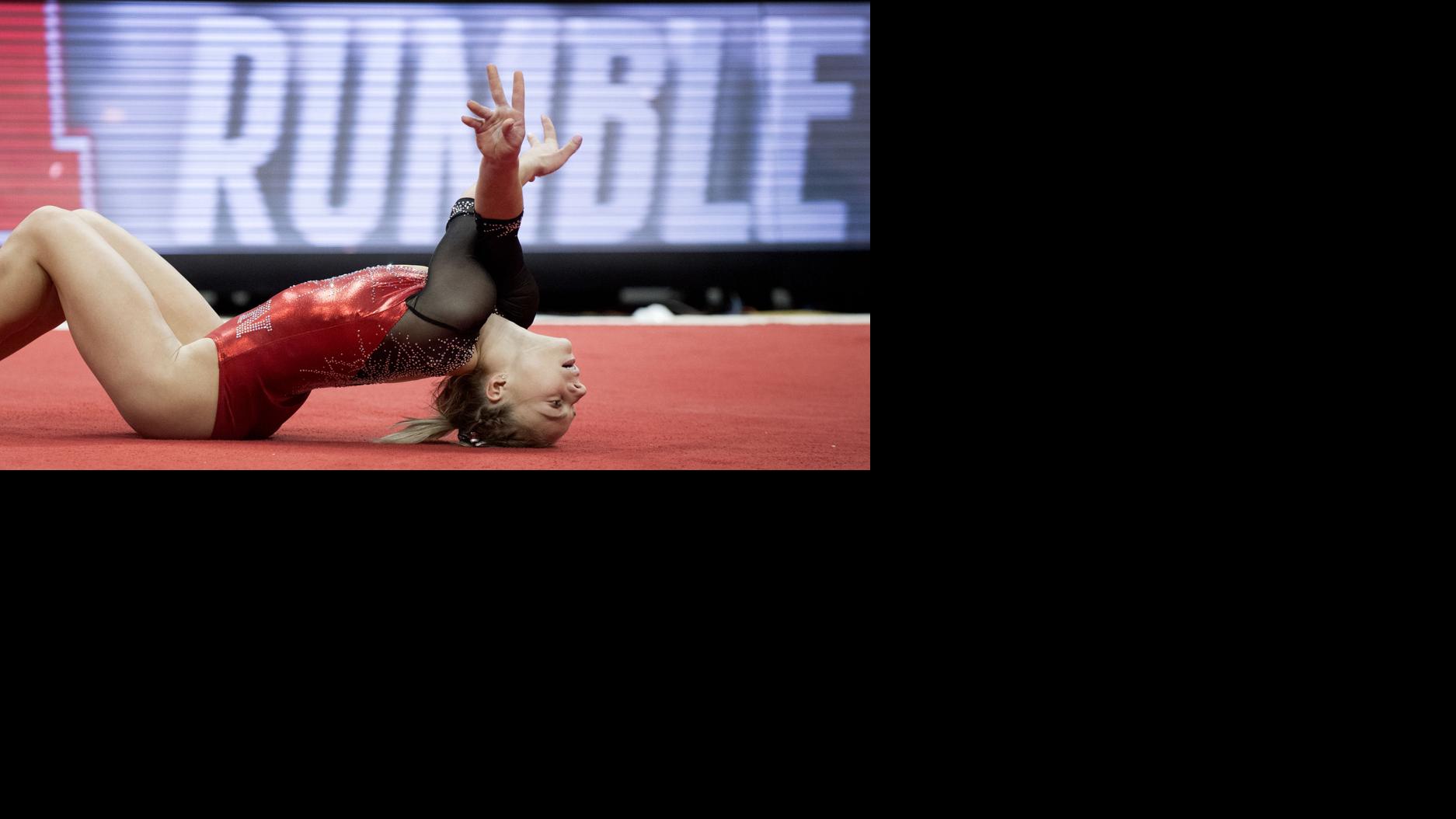 In NCAA-type environment, NU women's gymnastics squeaks past Washington