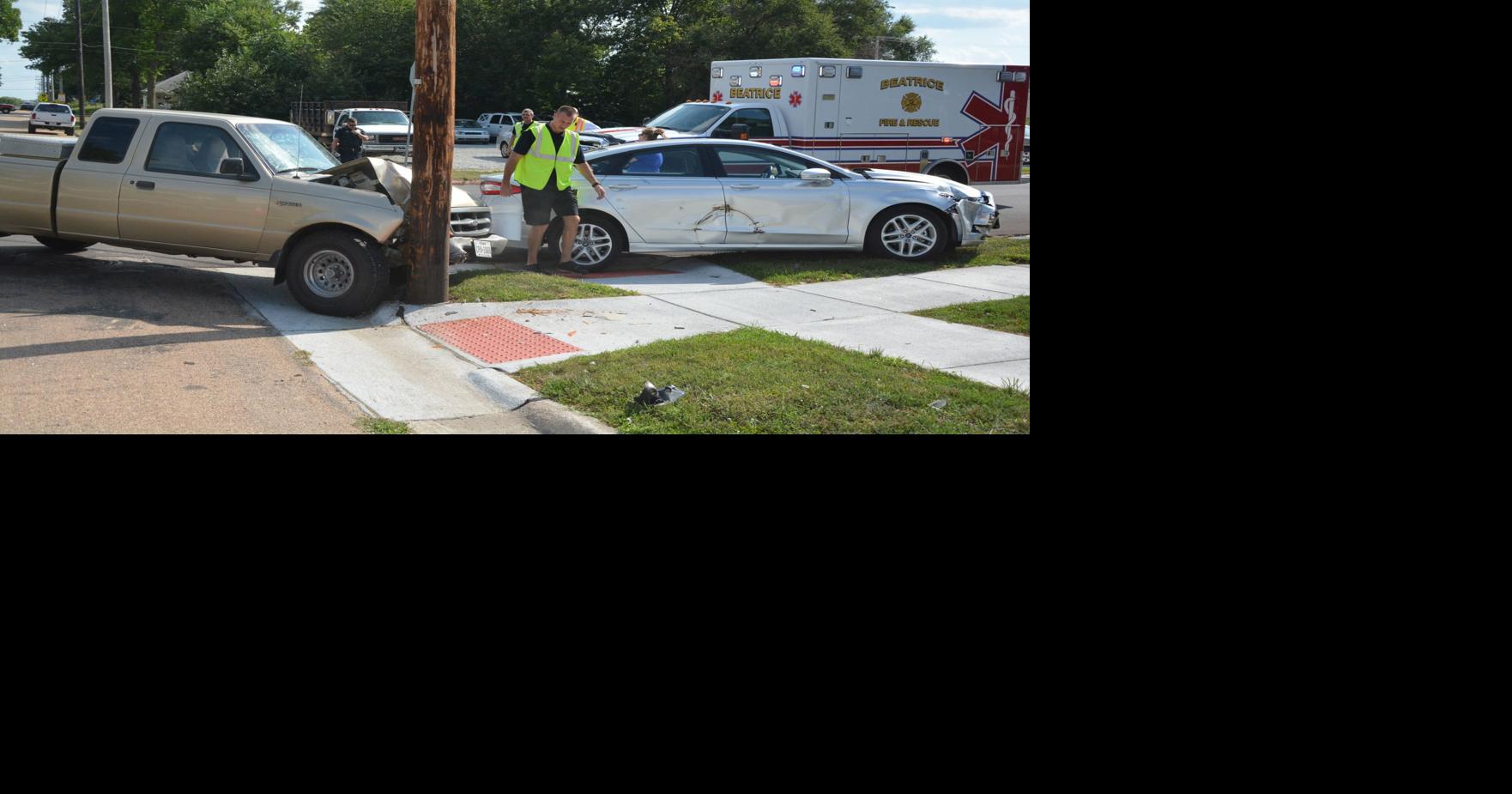 Truck crashes into light pole