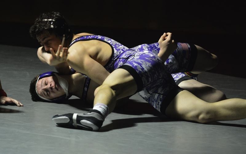 PHOTOS: North Brunswick wrestling beats Laney