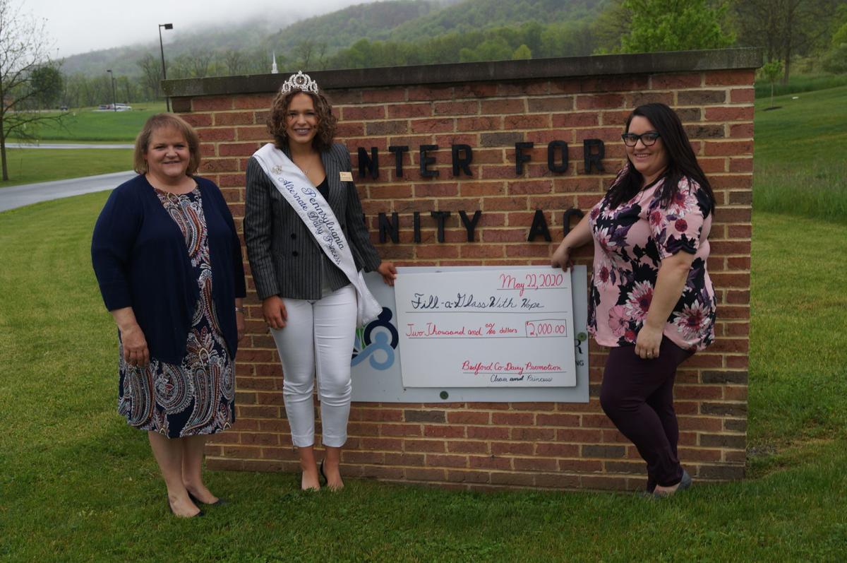Dairy Promotion Team Presents Check To Food Bank Coordinator News Bedfordgazette Com