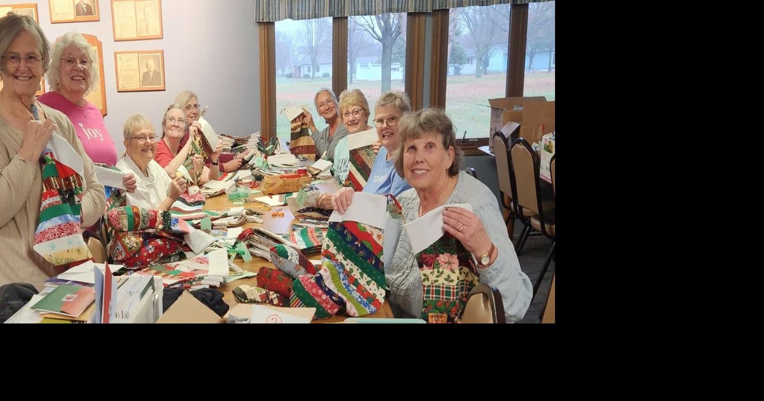 Charity Sew Day volunteers make stockings for the VA