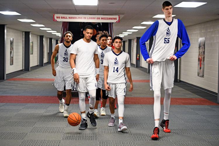 Chinese boy is 6 foot 9 inches and taller than an average NBA