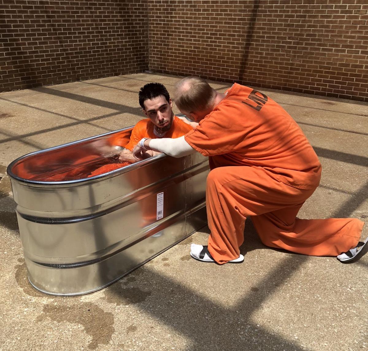 Two inmates are baptized in the Warren County jail News