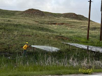 Downed power line causes brush fire off of I-90 | Local News ...
