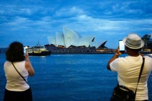 Australian state pushes tough gun laws, 'terror symbols' ban after shooting