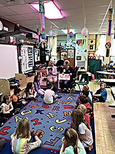 First Interstate Bank teaching kindergartners to save money