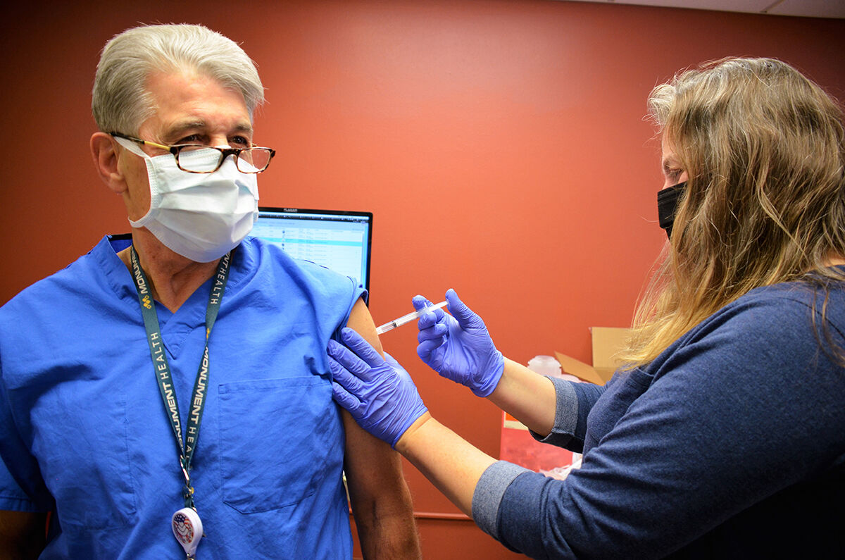 First caregiver COVID-19 vaccine administered in Deadwood - Vimarsana News