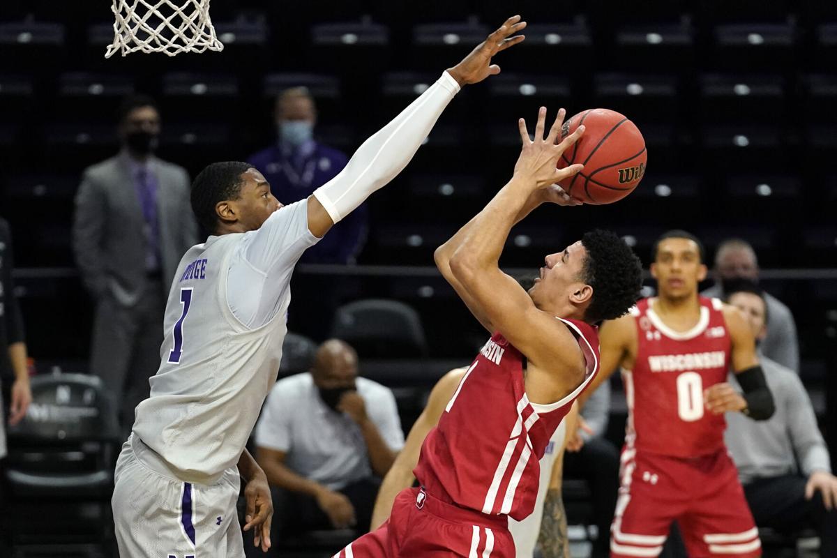 Wisconsin Badgers guard Johnny Davis (1) shown during the first half of an  NCAA college basketball game against Georgia Tech Yellow Jackets Wednesday,  Dec. 1, 2021, in Atlanta. (AP Photo/Hakim Wright Sr