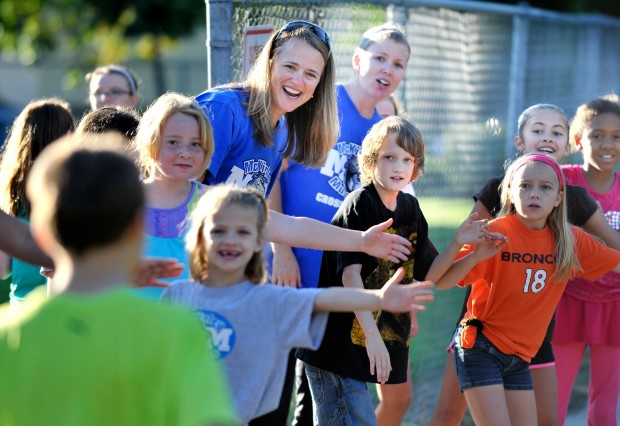 Parents, neighborhood get shoes for running grade-schoolers | Local ...