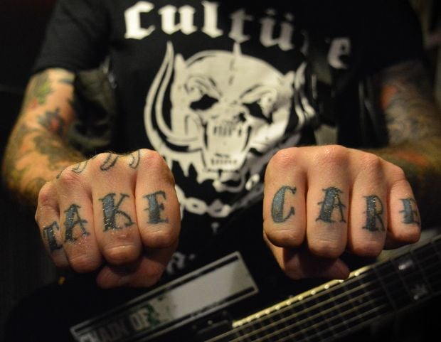 Say it in 8: Knuckle tattoos get personal, evolving far past 'Love' and ' Hate'