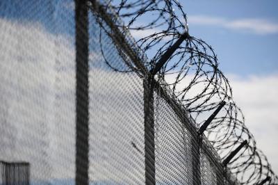 Razor wire adorns the high security fencing throughout Montana State Prison.