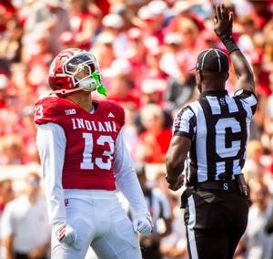 Indiana's Kellan Wyatt (13) celebrates his tackle of Kennesaw State's Alexander Diggs (3) for a loss during the Indiana versus Kennesaw State Big Ten football game at Memorial Stadium on Saturday, Sept. 6, 2025.