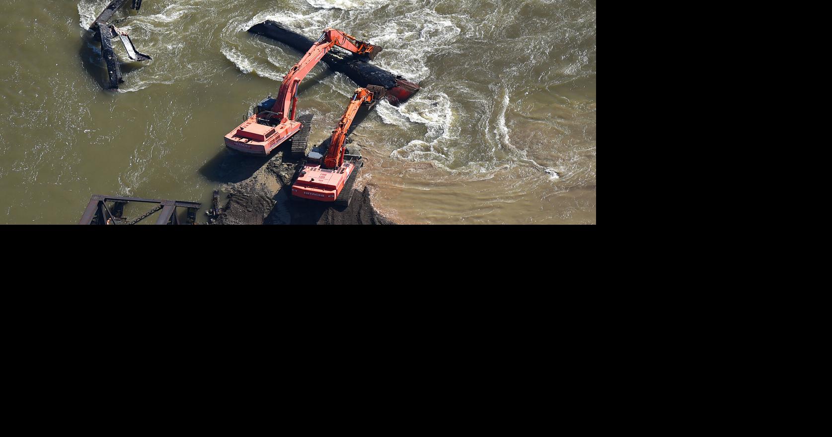 Debris from train crash found 50 miles downstream