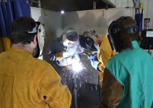 Photos: Upward Bound students attend welding workshop on Friday