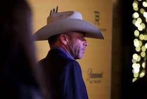 Taylor Sheridan walked down the red carpet event before a screening of "Yellowstone" Season 5 premiere on Nov. 13, 2022, at Hotel Drover in Fort Worth, Texas.