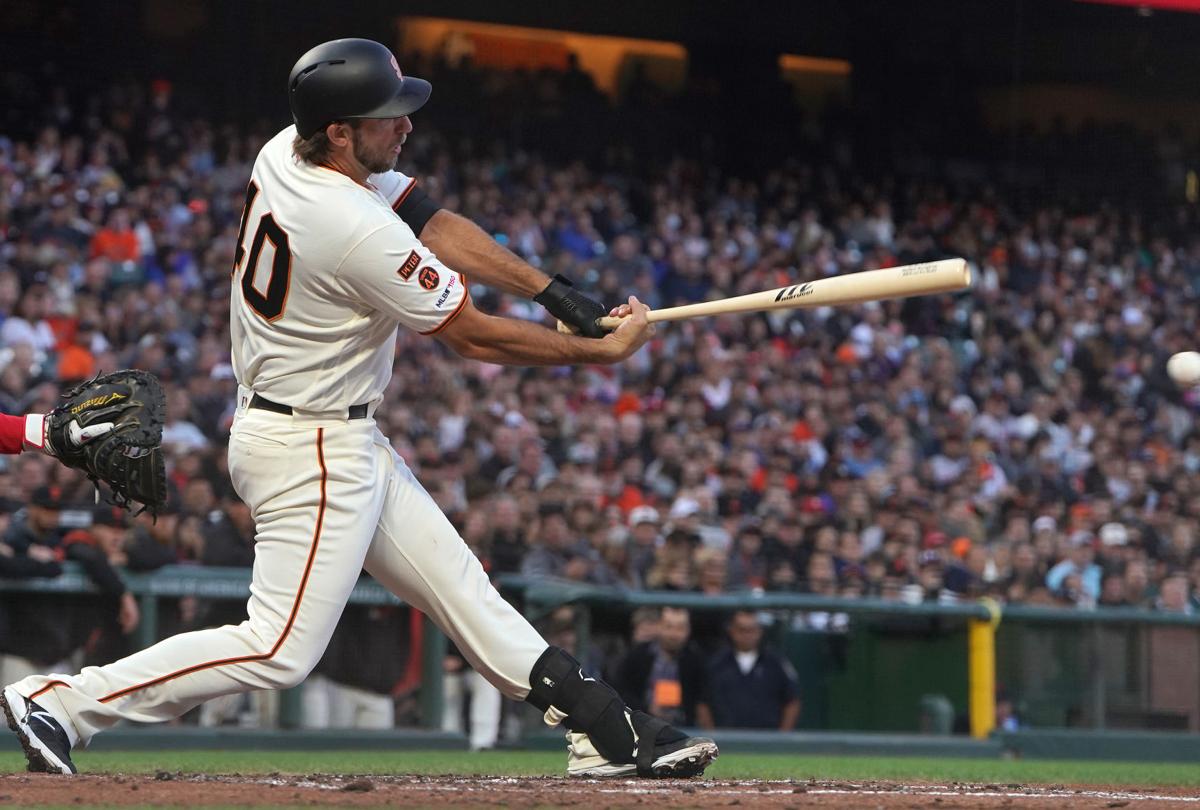 Madison Bumgarner (40) of the San Francisco Giants gets a base hit against the Philadelphia Phillies in the bottom of the third inning on Aug. 8, 2019 at Oracle Park in San Francisco, Calif.
