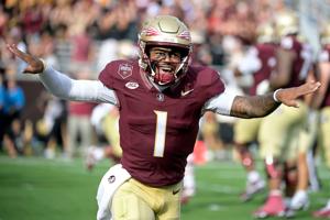 Aug 30, 2025; Tallahassee, Florida, USA; Florida State Seminoles quarterback Tommy Castellanos (1) celebrates after a touchdown against the Alabama Crimson Tide during the second half at Doak S. Campbell Stadium. Mandatory Credit: Melina Myers-Imagn 