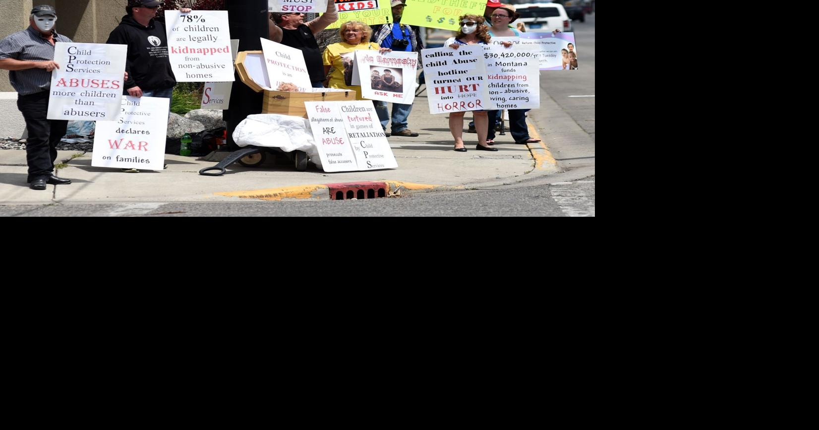 Group pickets in front of Child Protective Services in downtown Billings