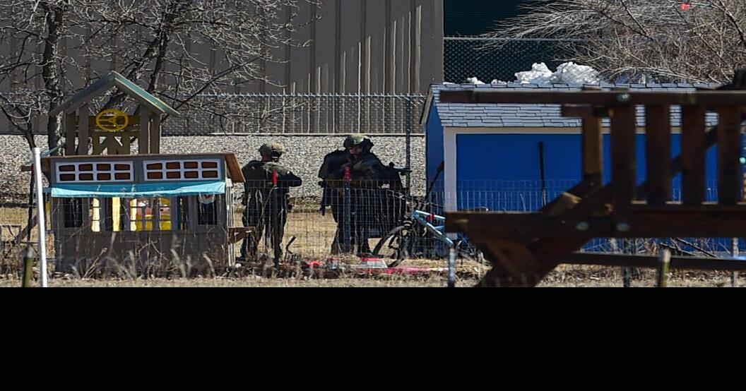 Standoff in the heights continues, officer shot