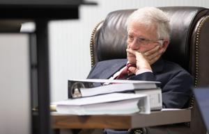 Molnar's back in office for NWE merger hearing after restraining order issued against PSC