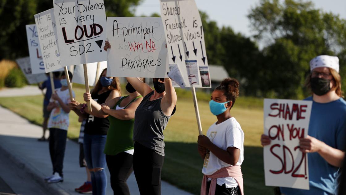 Protesters call for district action on Medicine Crow principal over social media use | Local News