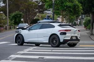 A Waymo driving down Church Street on Friday, May 22, 2026, in San Francisco, California.