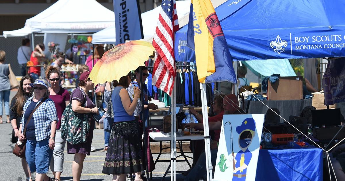 Storm creates challenges for Summerfair at new Rimrock Mall location