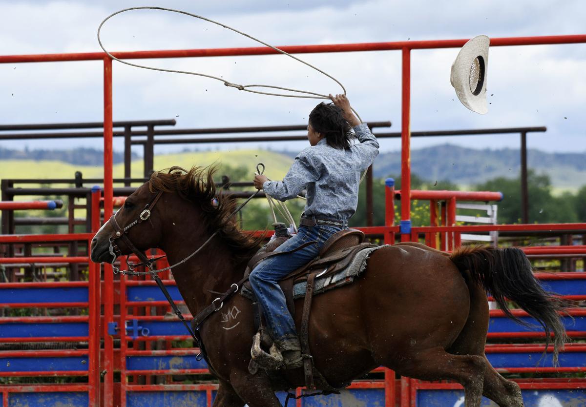 Photos Cowboys compete in the Crow Native Days Rodeo