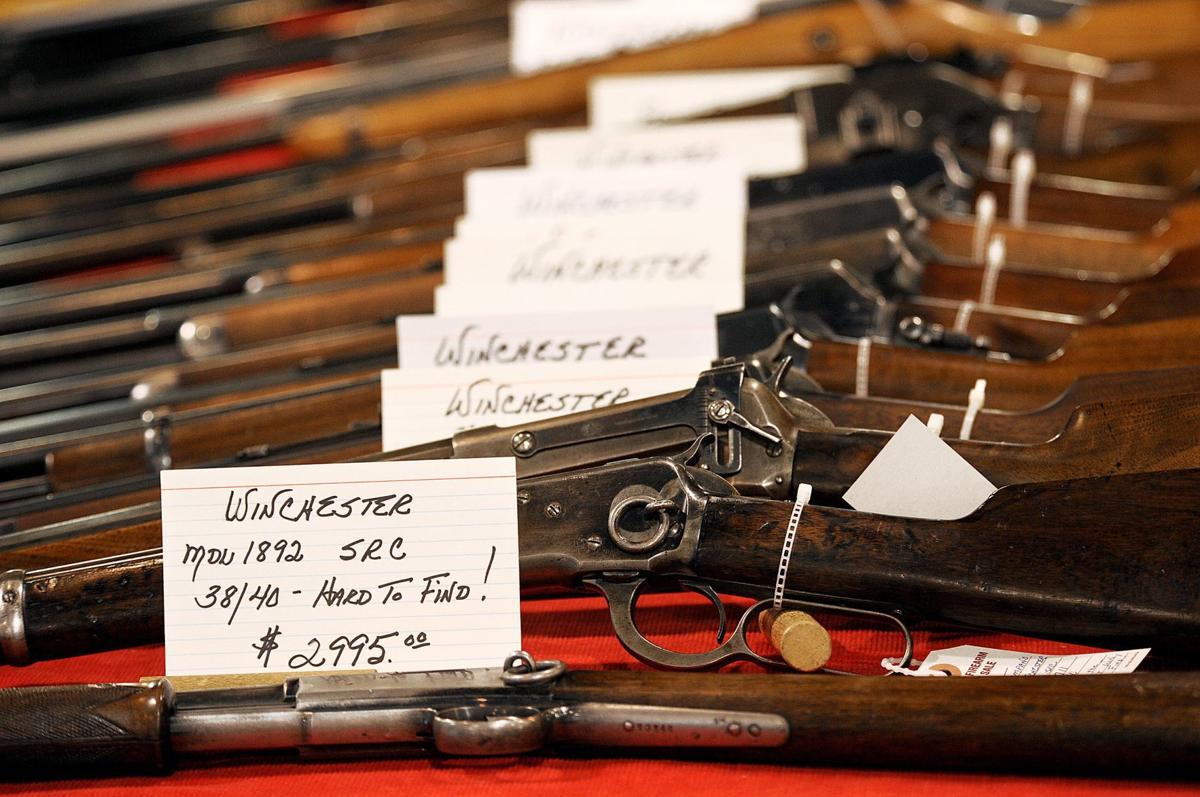 Winchester rifles at a gun show