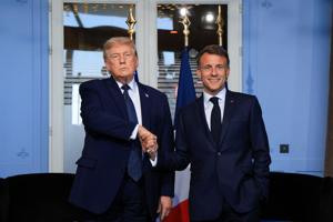 U.S. President Trump and French President Macron attend a bilateral meeting on the sidelines of the G7 summit, in Evian